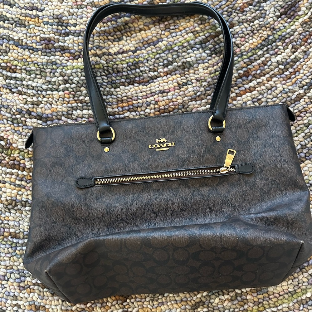 A brand new Coach coated leather tote